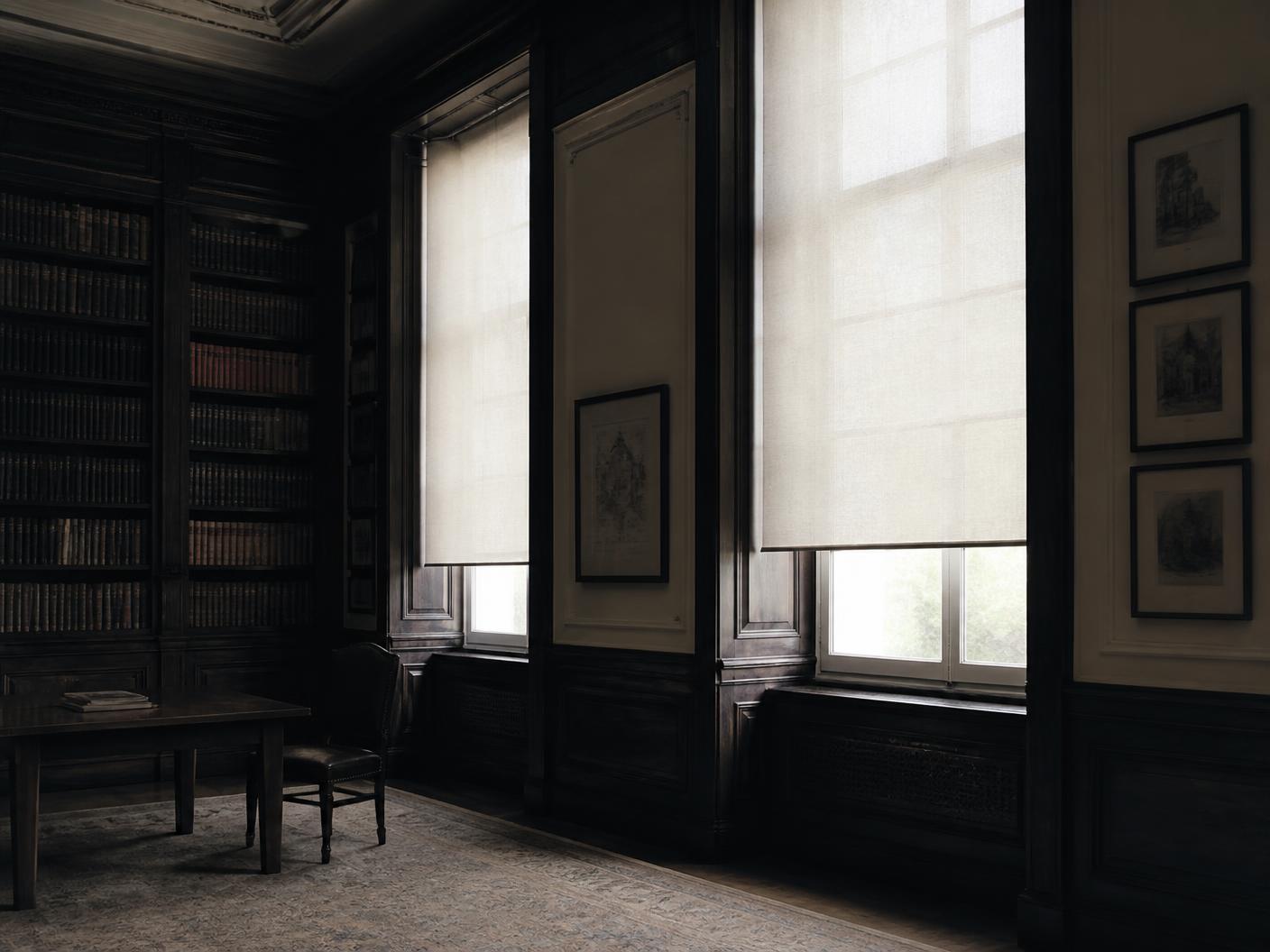 Quiet panelled reading room with tall shaded windows
